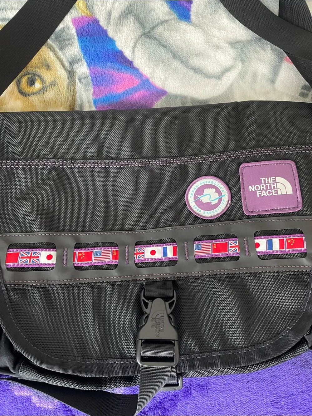 The North Face Black Messenger Bag with Yellow Accents